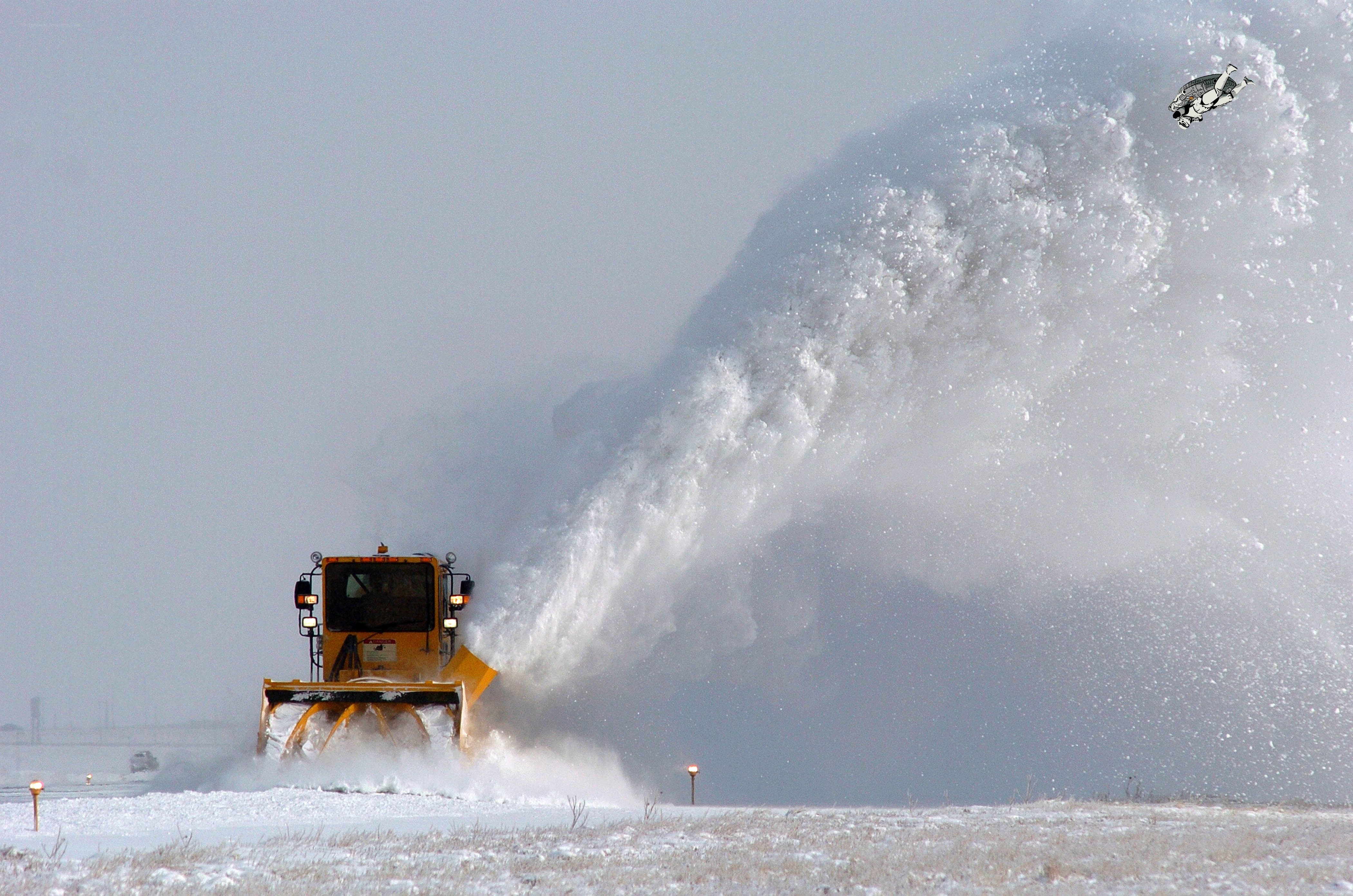 Snowplow clearing snow