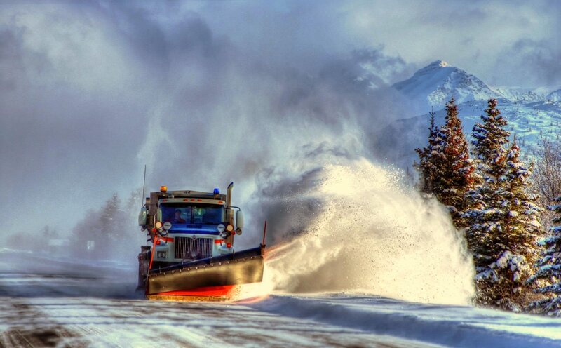 Snowplow Truck Clearing Road