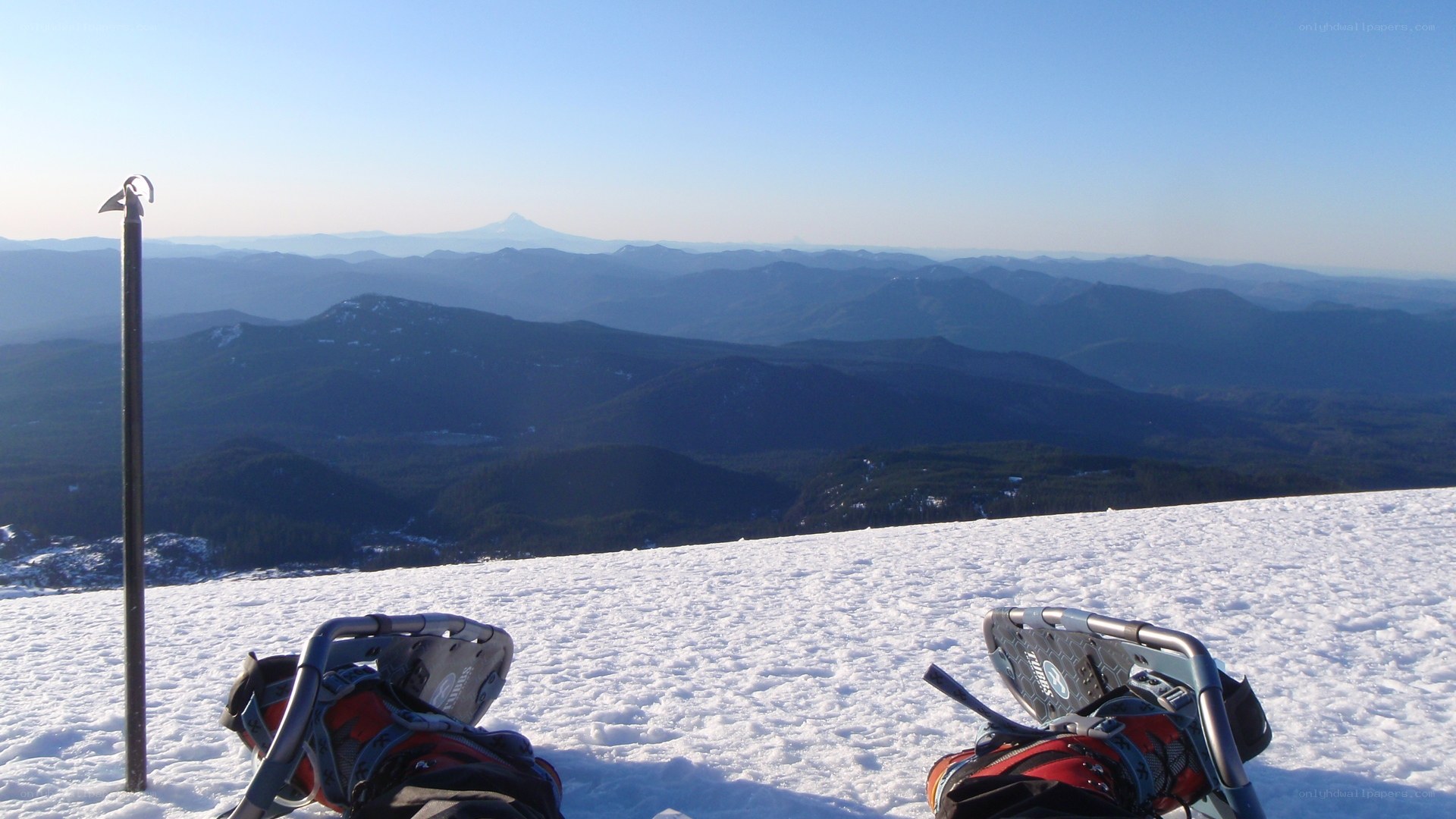Snowshoes on a mountain peak