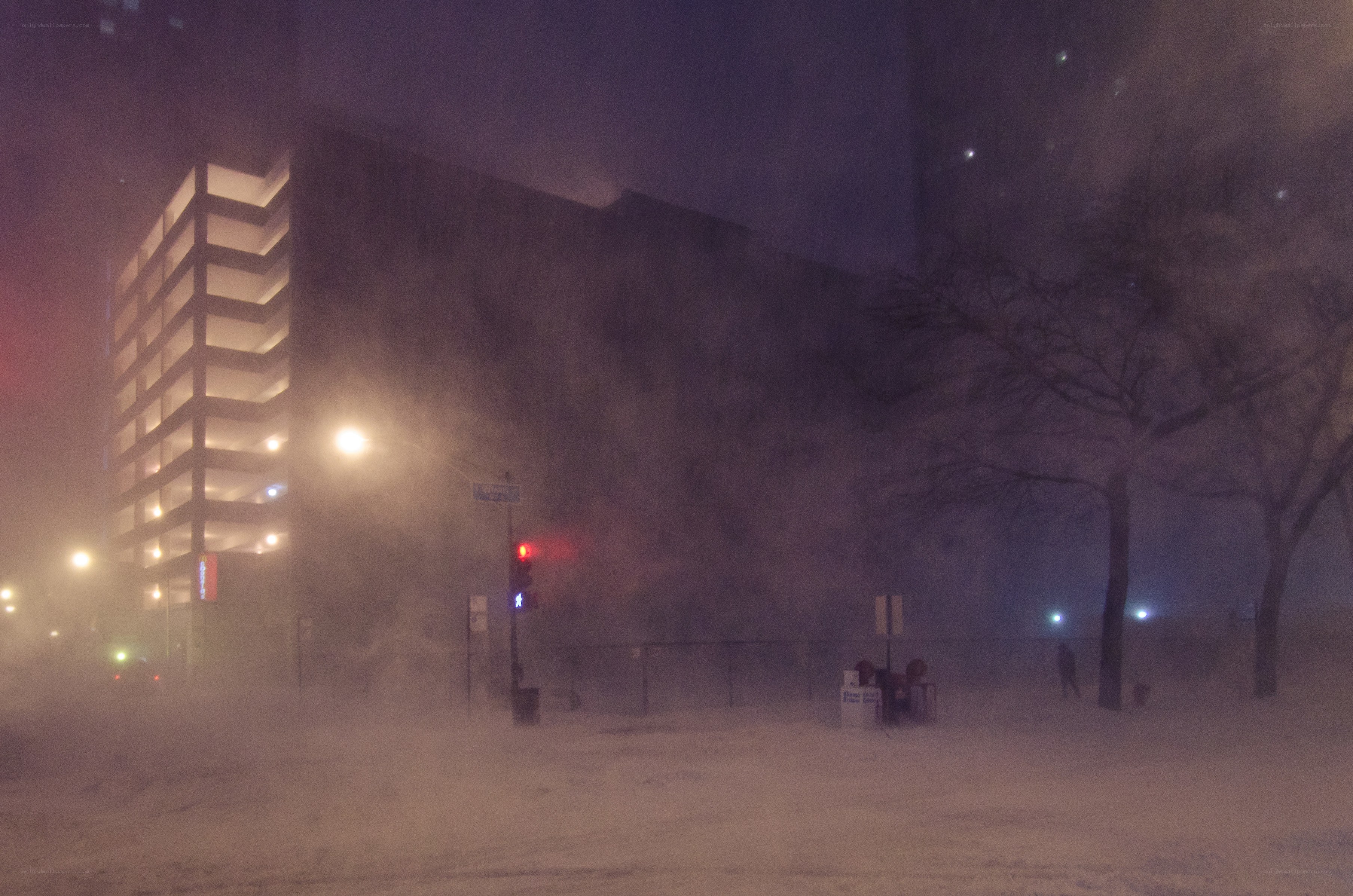 Snowstorm at night in city