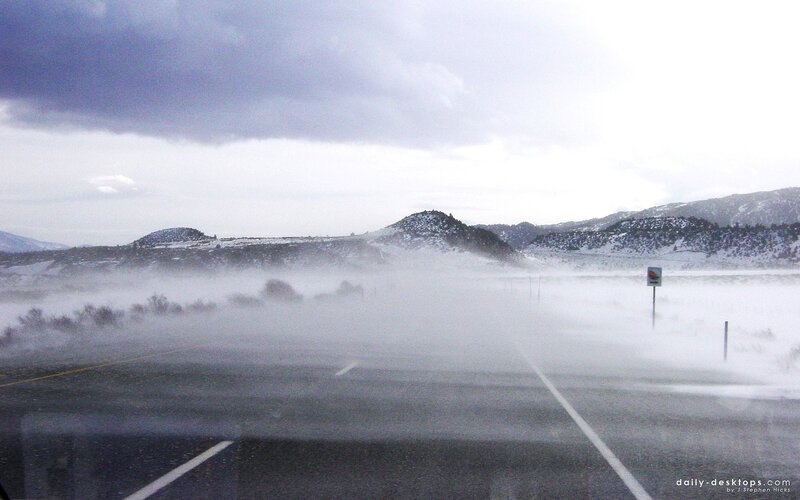 Snowstorm on a mountain road