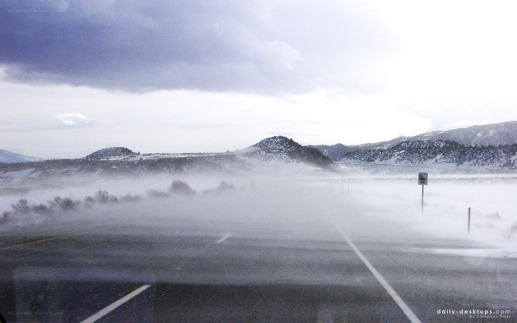 Snowstorm on a mountain road