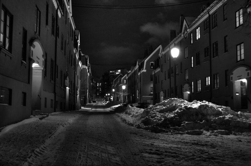 Snowy alley at night