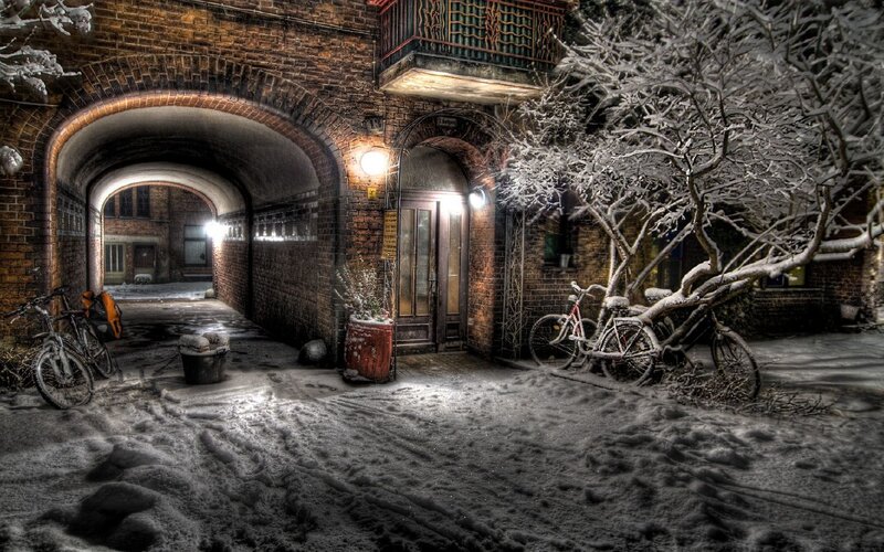 Snowy alley at night