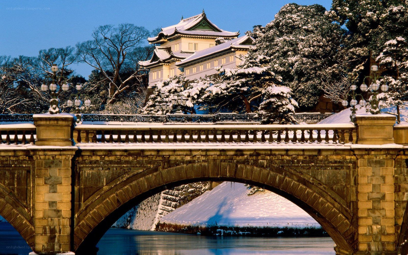 Snowy bridge and castle