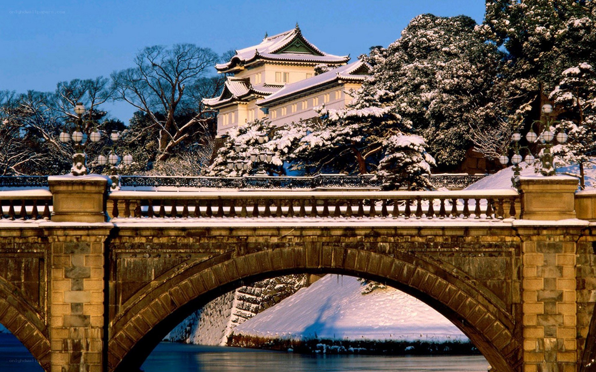 Snowy bridge and palace