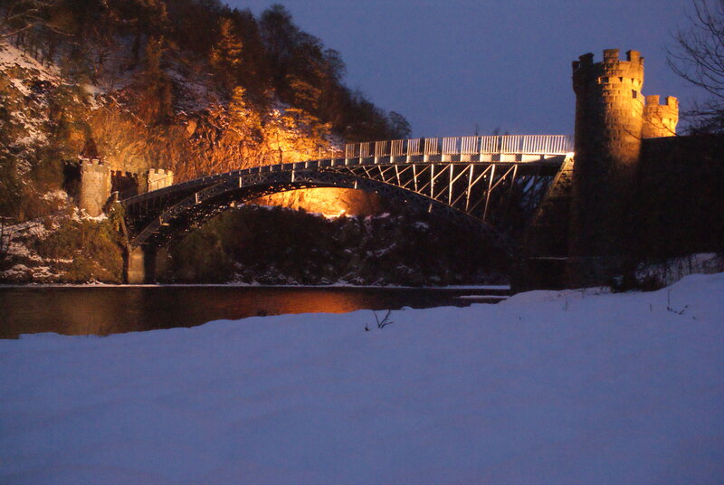 snowy bridge at dusk