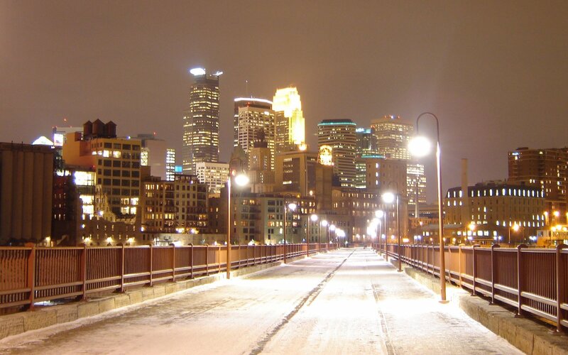 snowy bridge at night in minneapolis