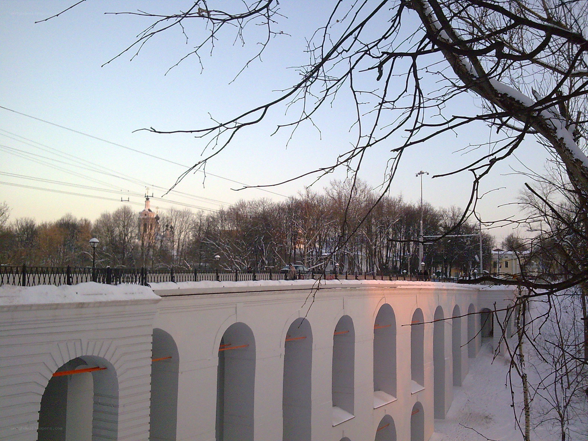 snowy bridge with arches