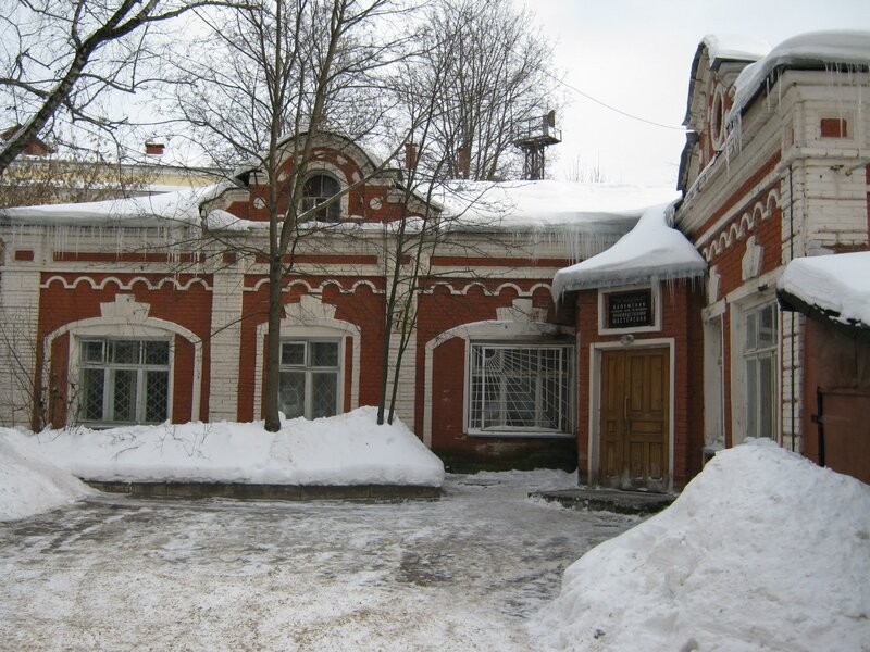 snowy building with icicles