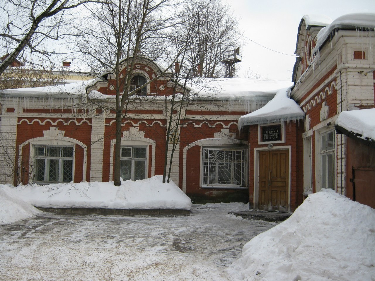 snowy building with icicles