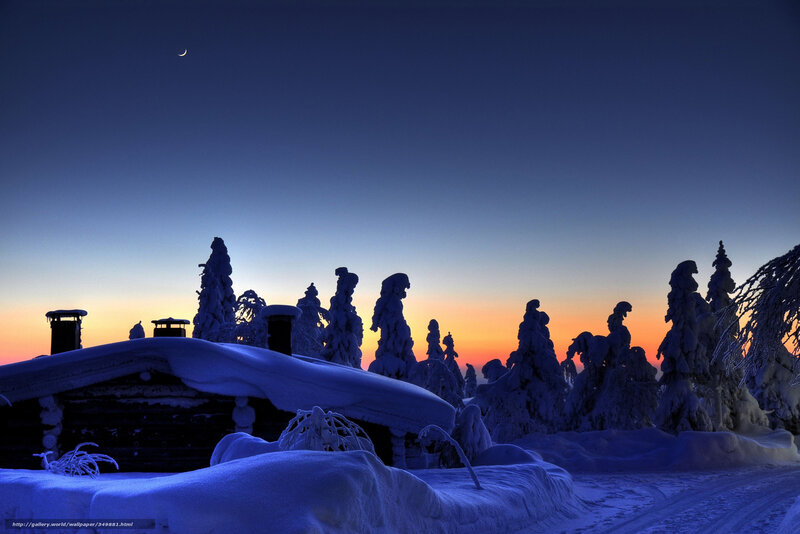 Snowy cabin at dusk