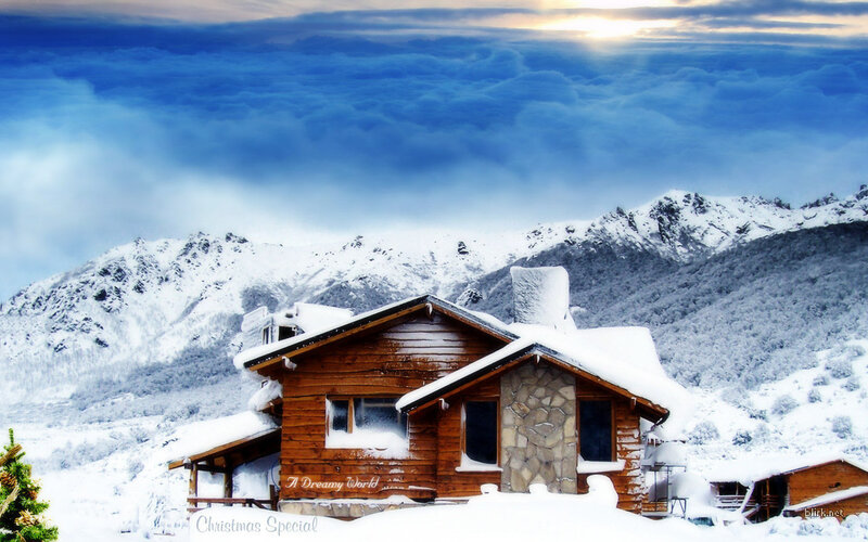 Snowy cabin in mountain landscape