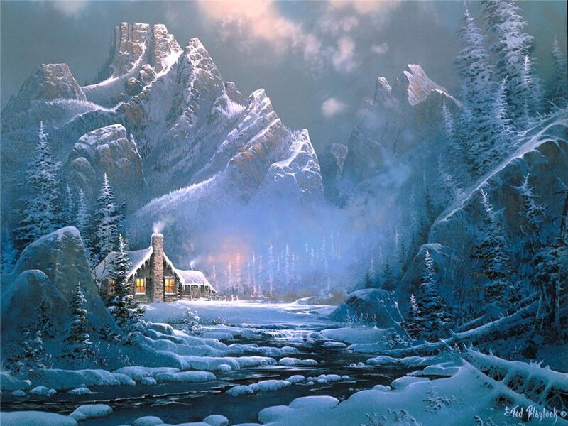 Snowy cabin in mountain valley