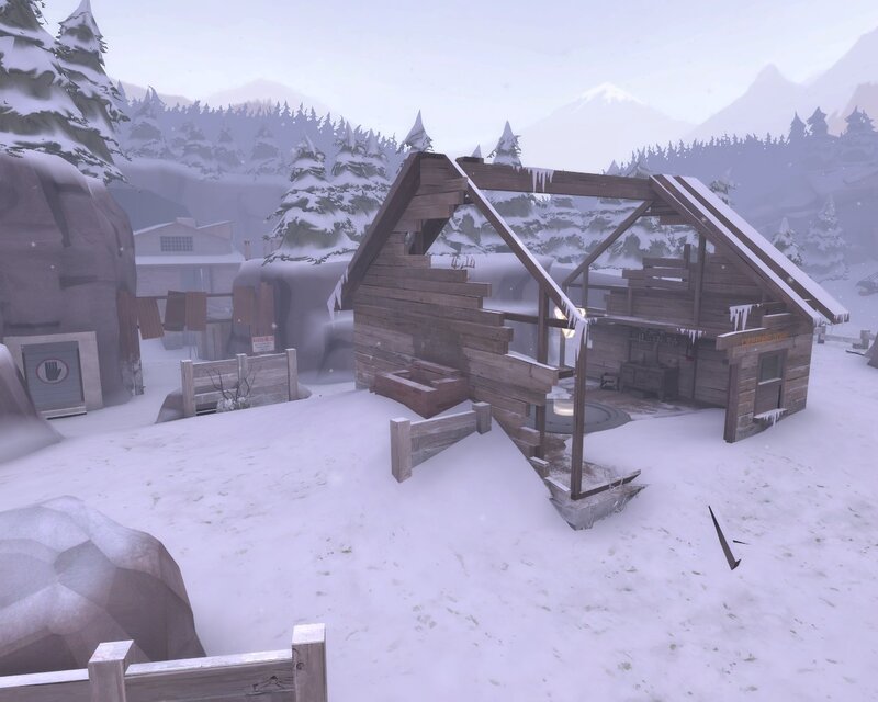 snowy cabin in winter landscape