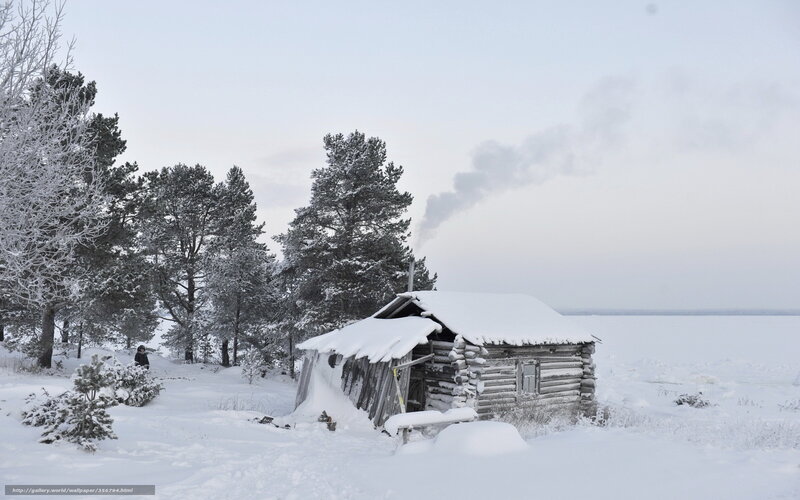 Snowy cabin in winter