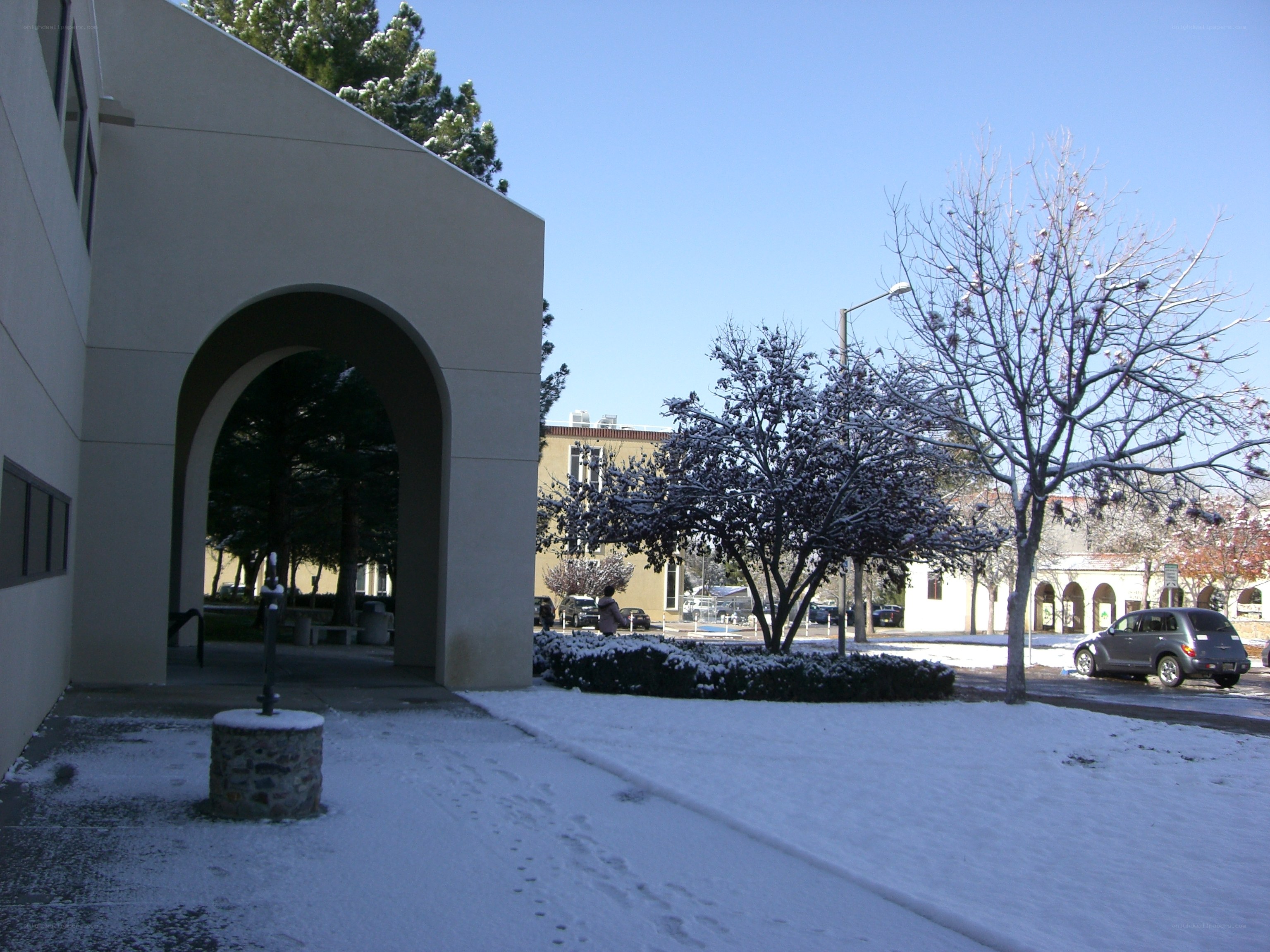 Snowy campus scene with archway