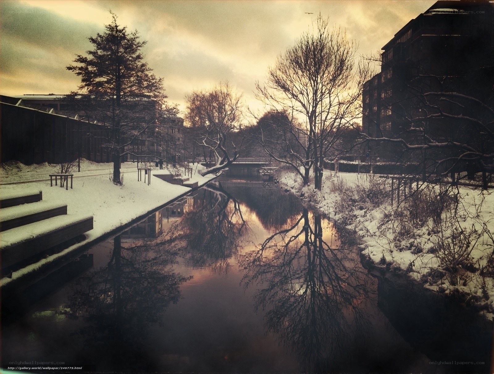 Snowy canal at dusk