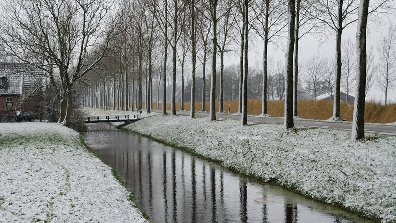Snowy canal in winter