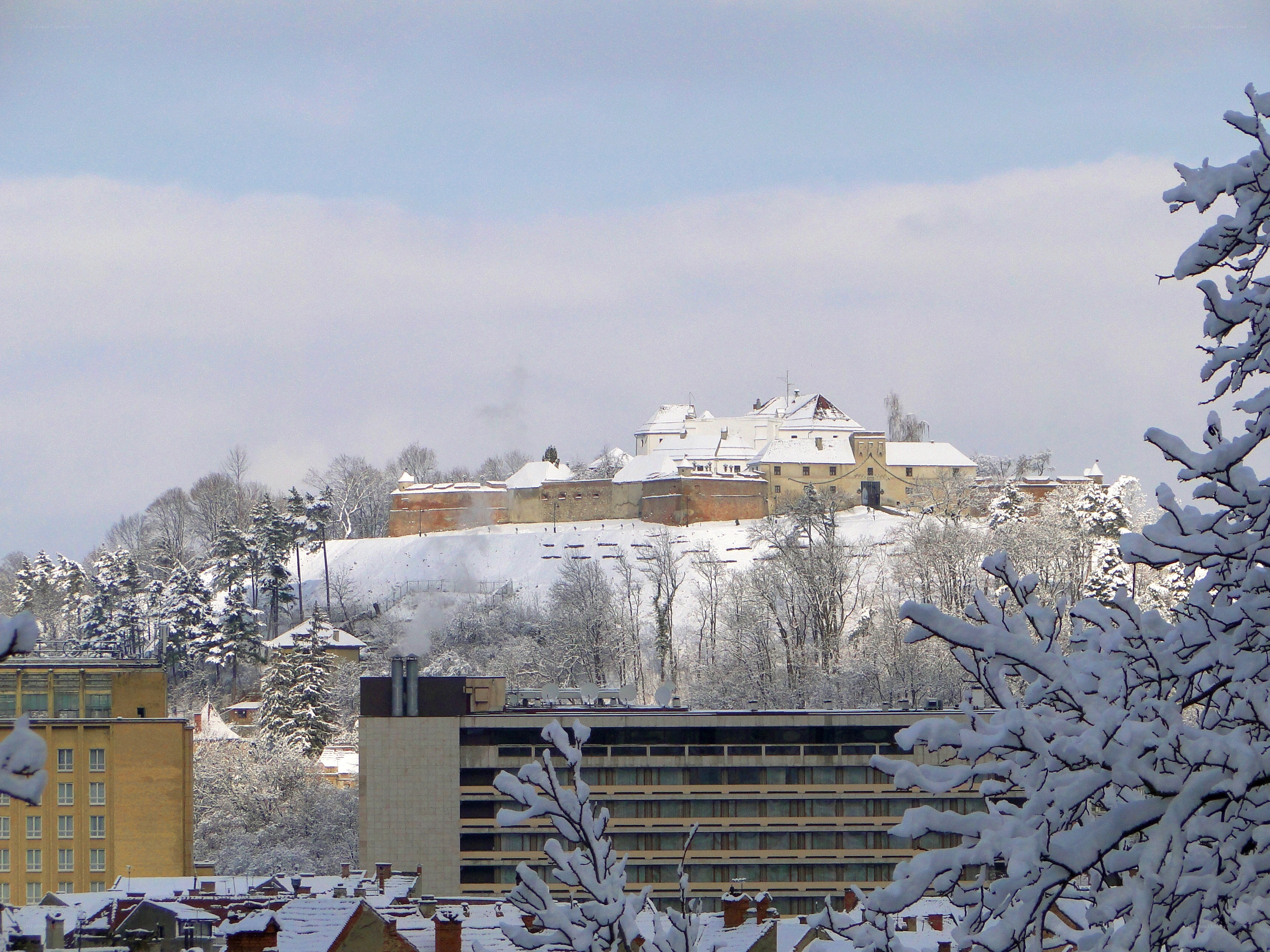 Snowy castle on a hill