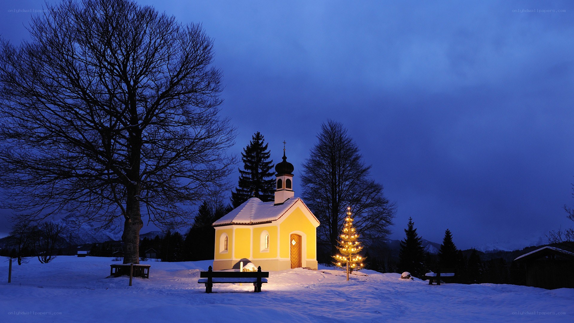 Snowy chapel at dusk