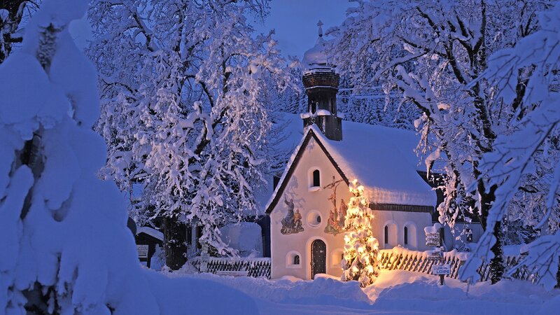 Snowy chapel at dusk