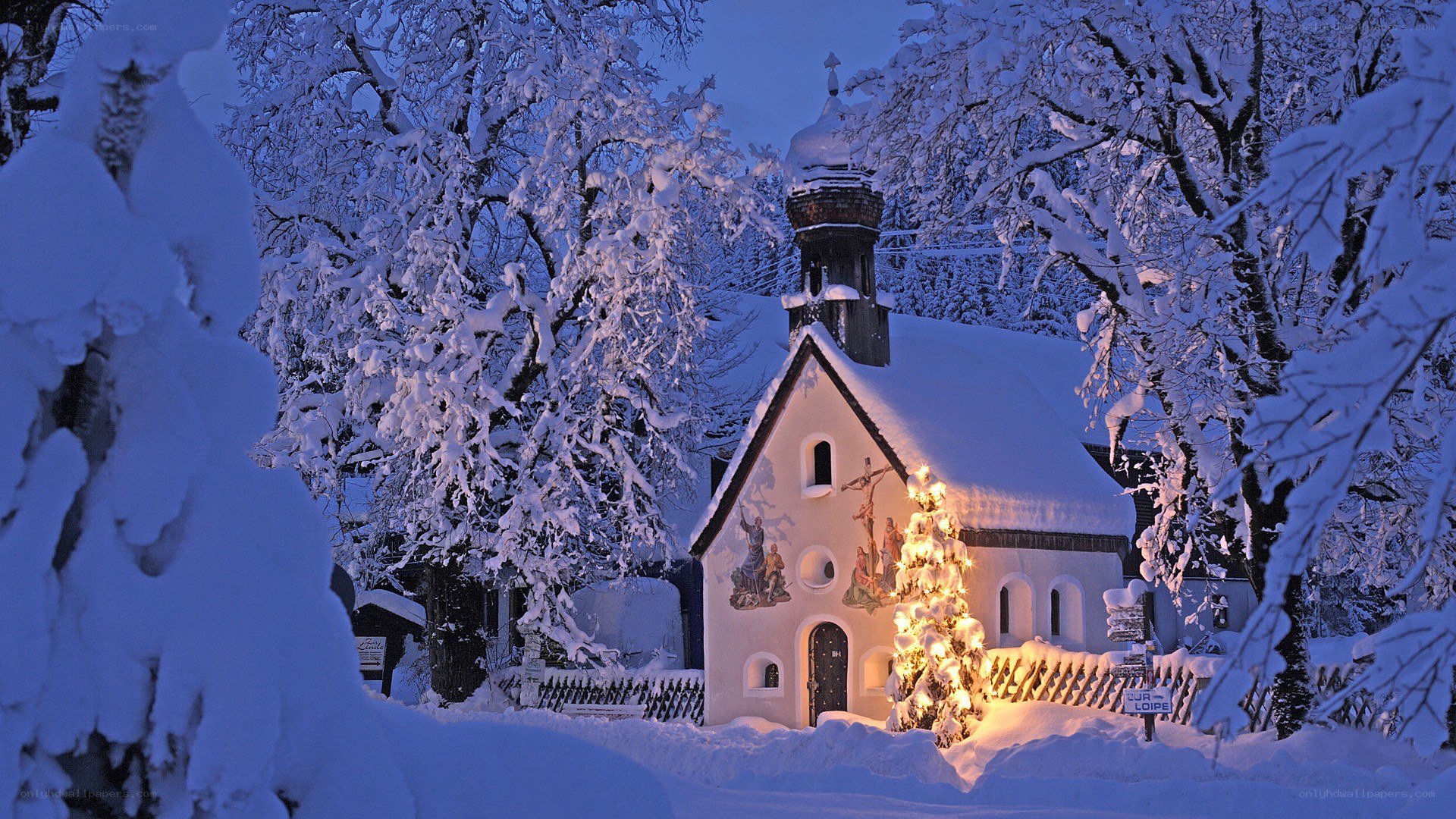 Snowy chapel at dusk