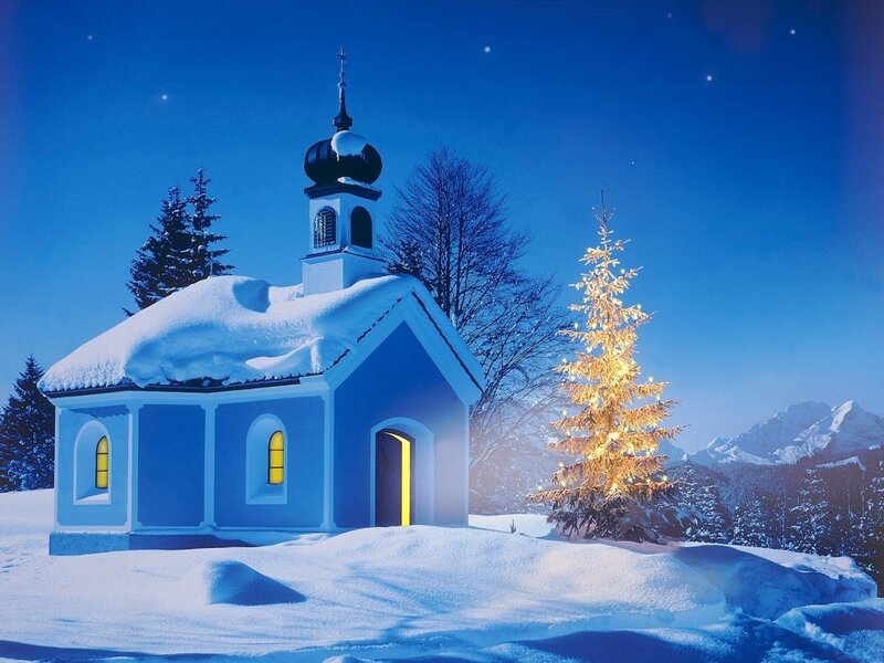 Snowy chapel at night