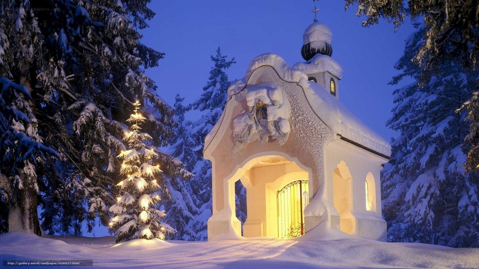 Snowy chapel at night