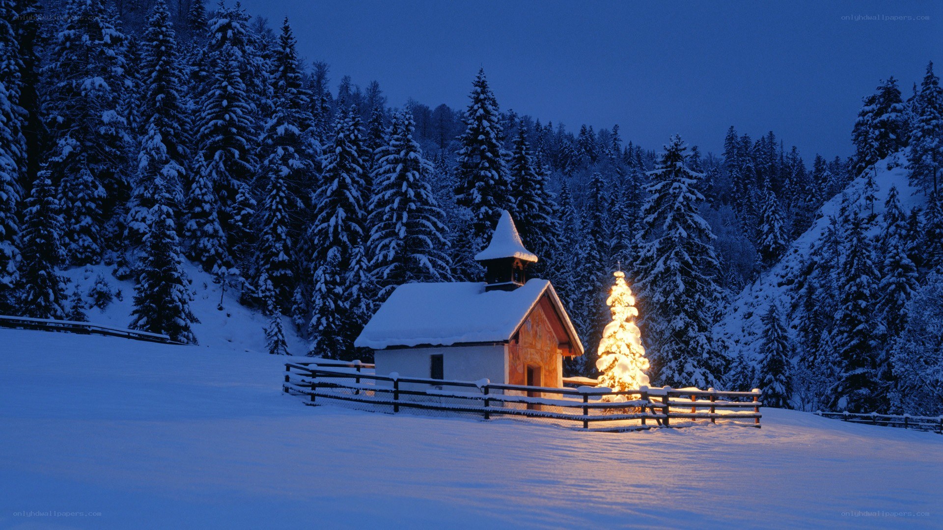 Snowy chapel at night