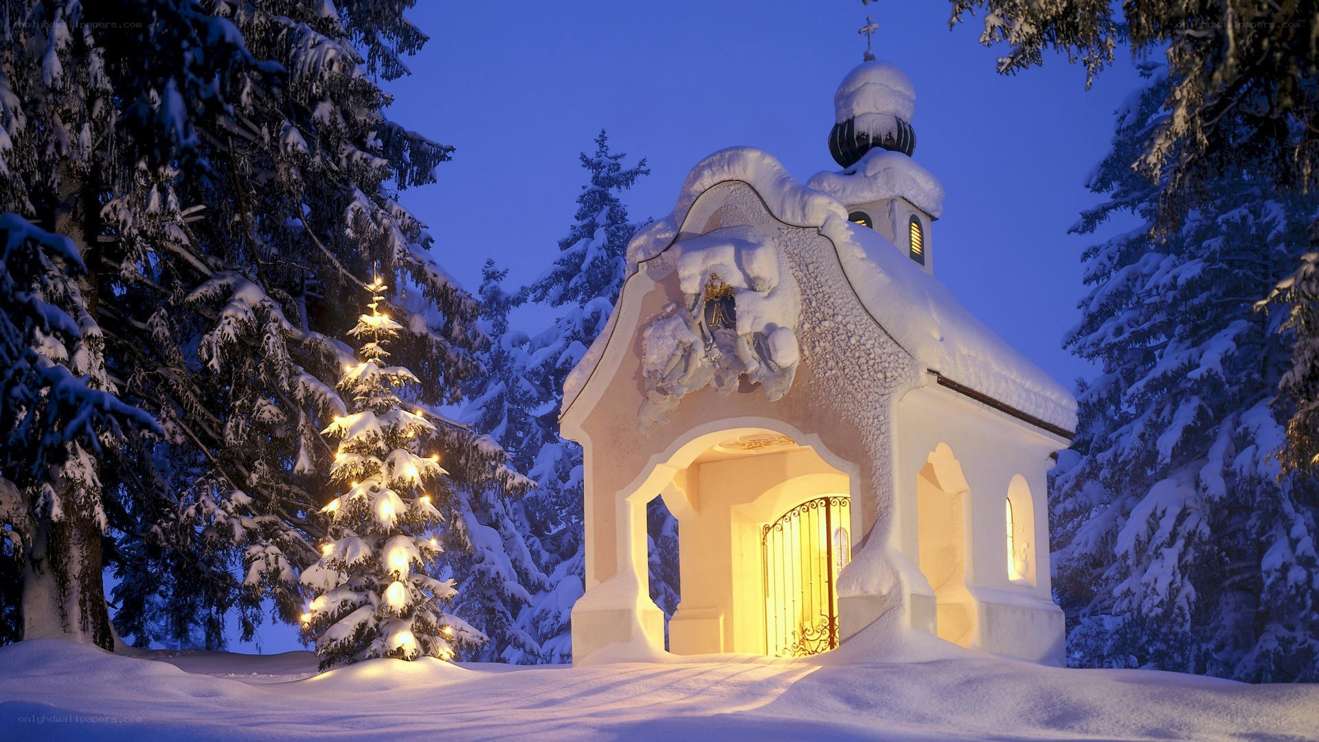 Snowy chapel at night