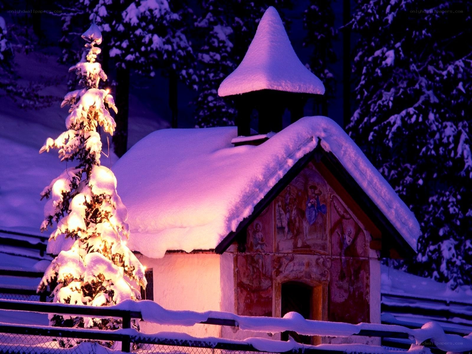 Snowy chapel at night