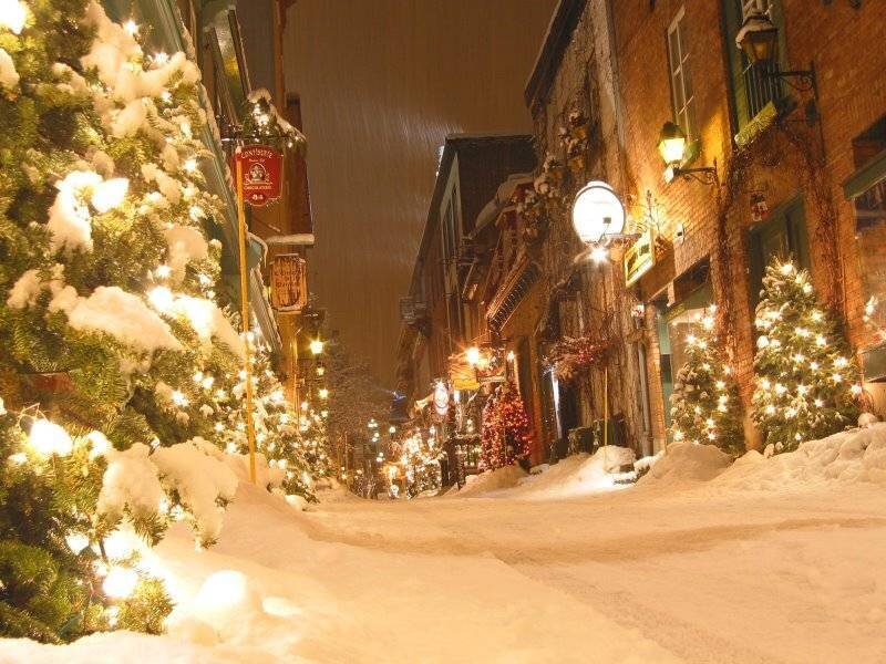 snowy christmas street at night