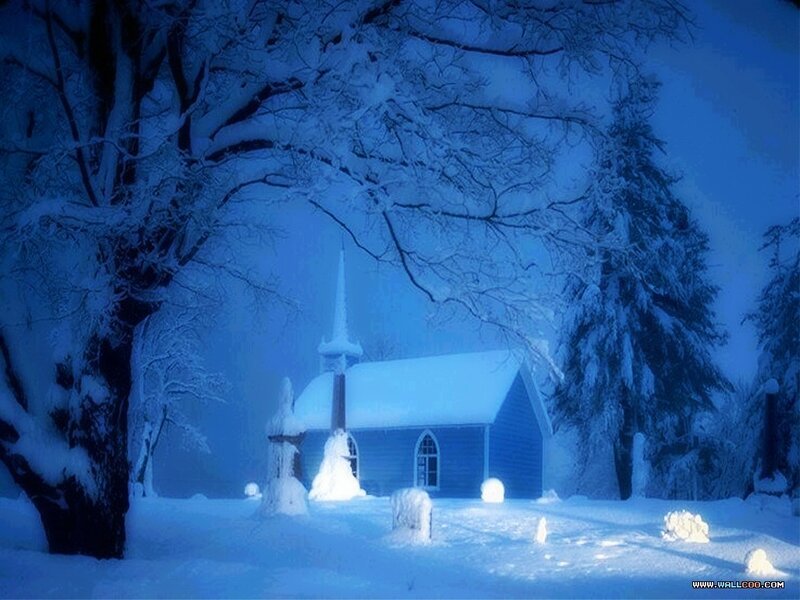 Snowy church at night