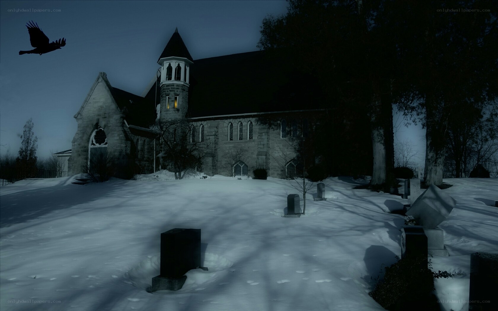 Snowy church at night