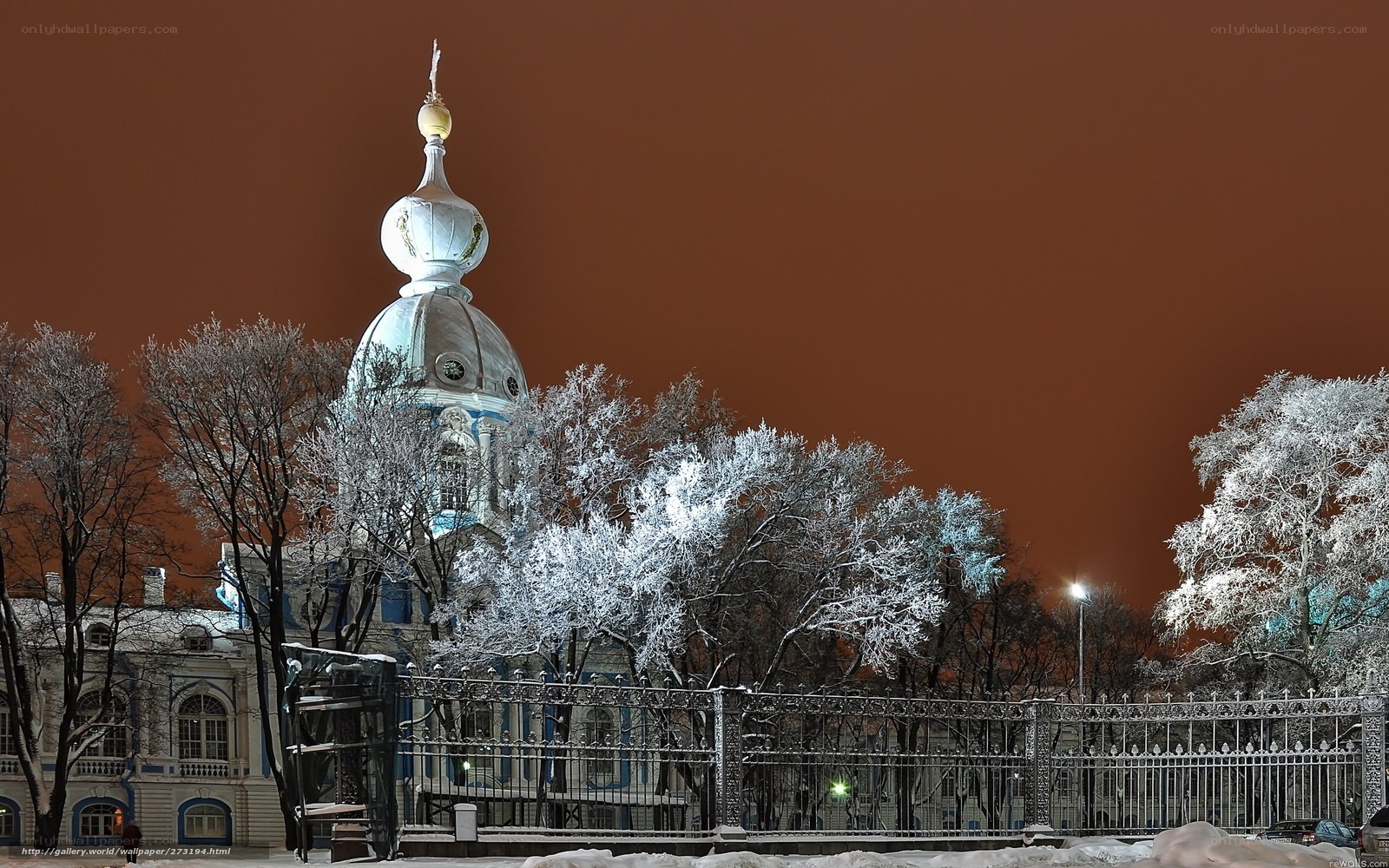 Snowy church at night