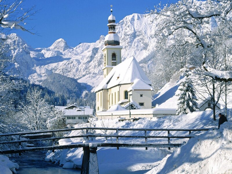 Snowy church in alpine village