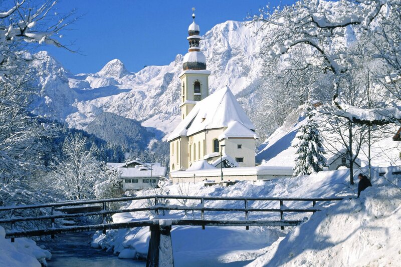 Snowy church in mountain village