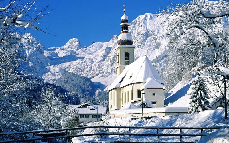 Snowy church in the Alps
