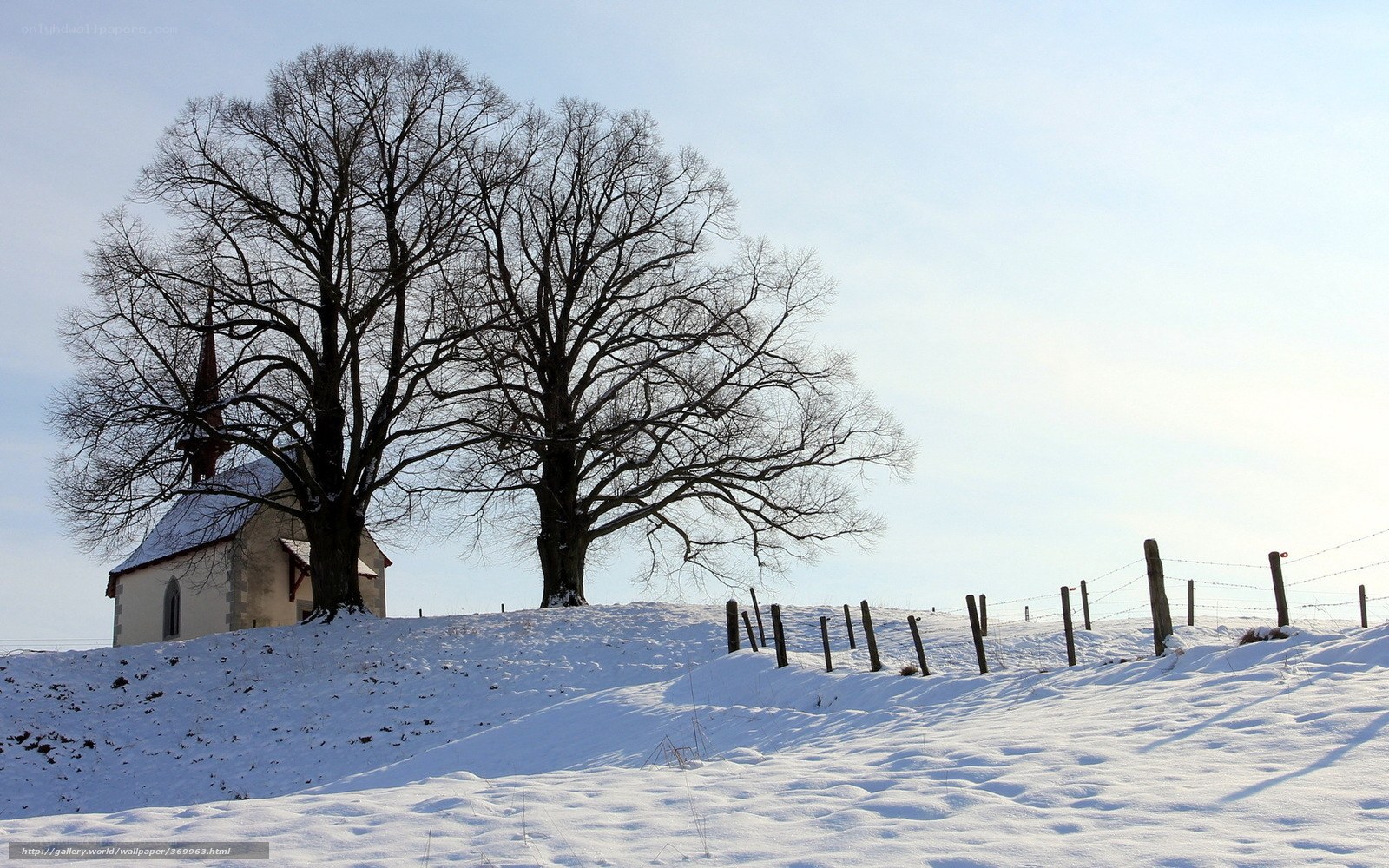 Snowy church on a hill