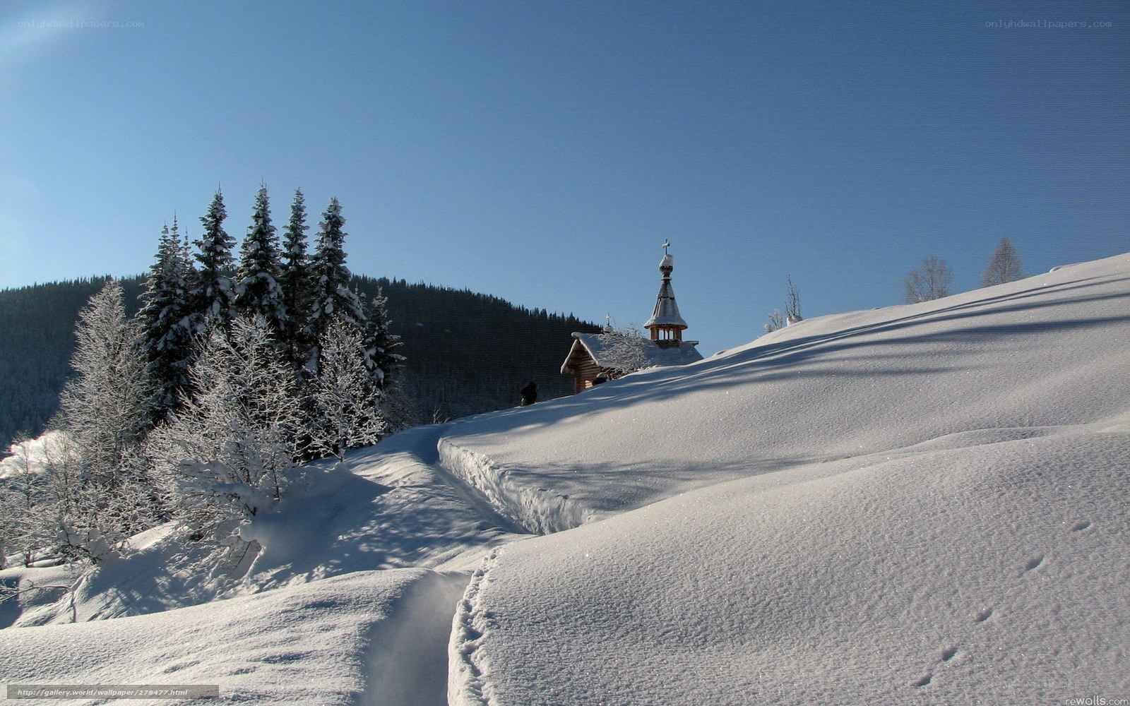Snowy church on a winter hill