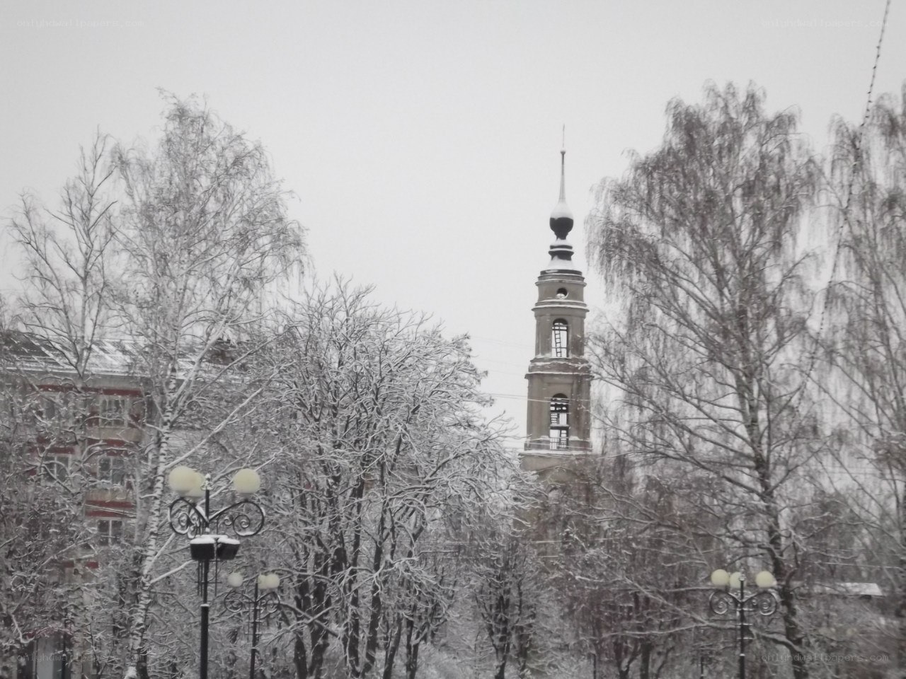 Snowy church tower view