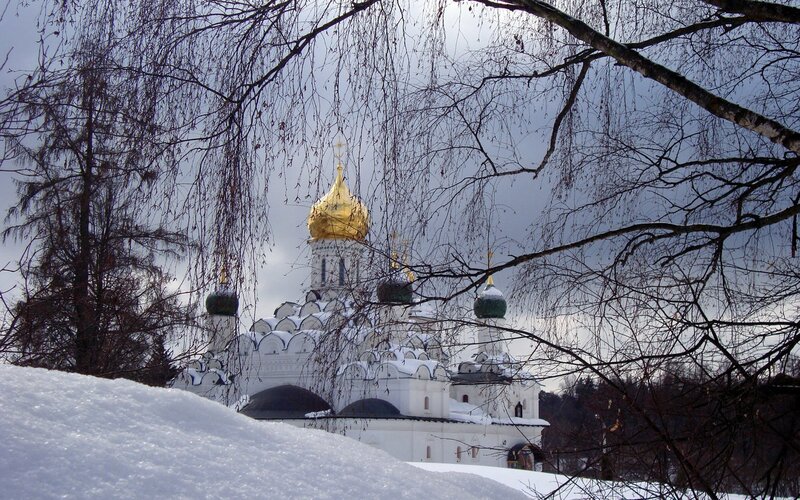 Snowy church with golden dome