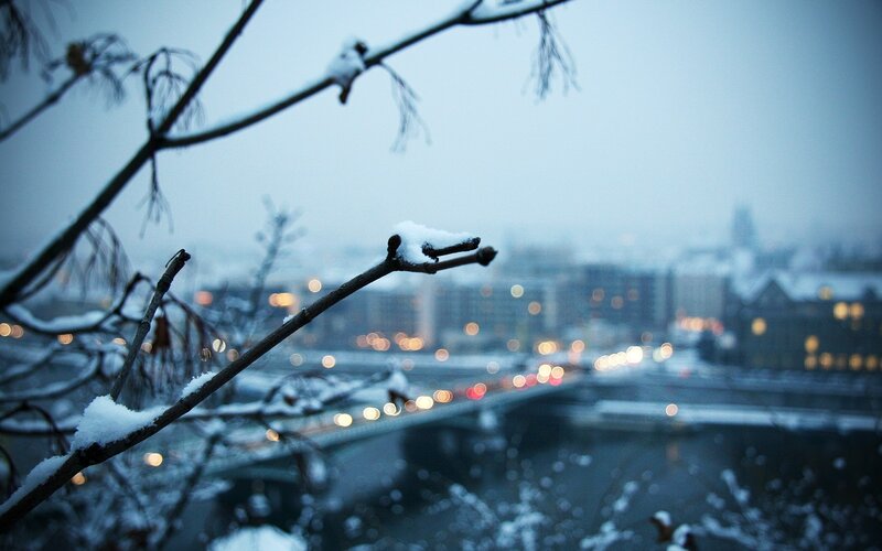 snowy city at dusk