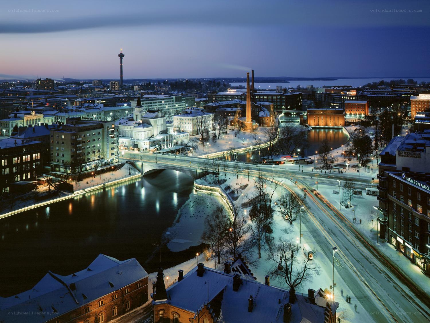 Snowy city at dusk