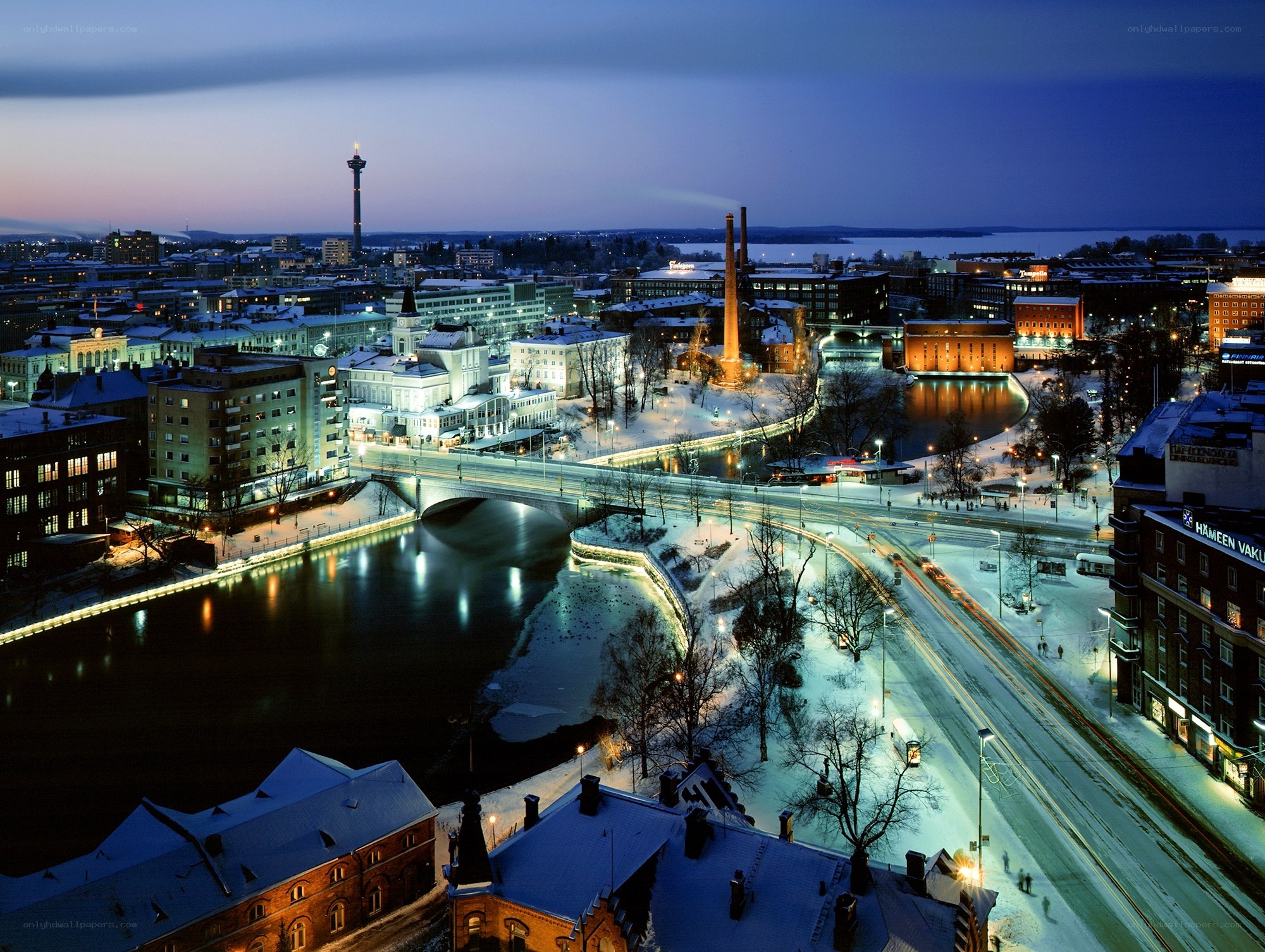 Snowy city at dusk