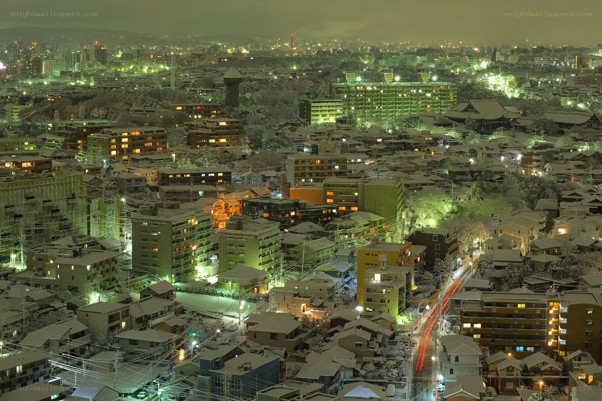 snowy city at night