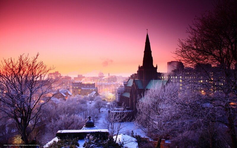snowy city at sunset