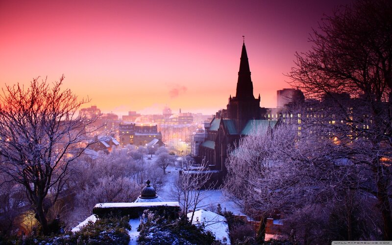 snowy city at sunset