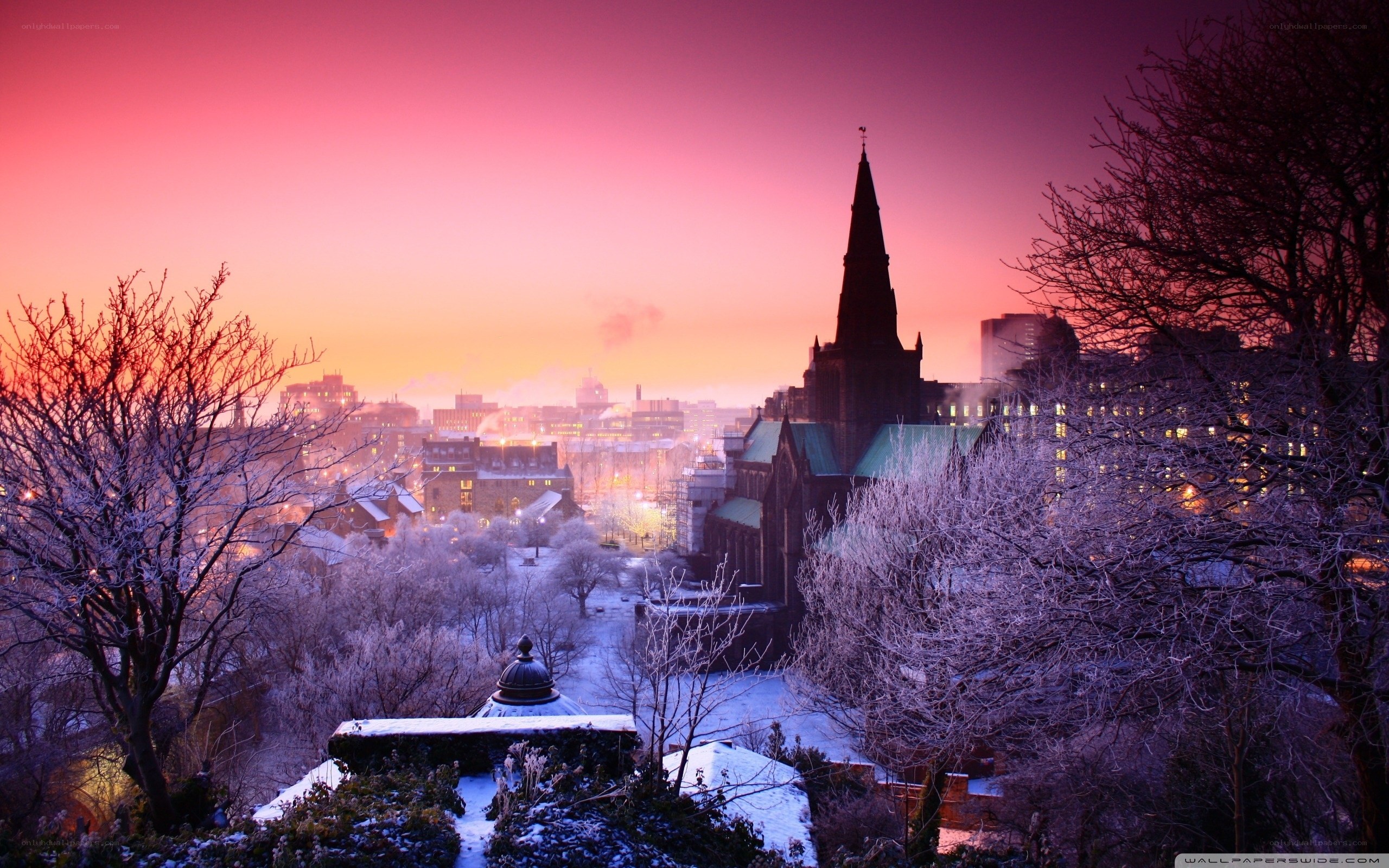 snowy city at sunset